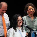 Labor union members and political candidates at a campaign event illustrating the changing role of labor union endorsements in NYC elections.