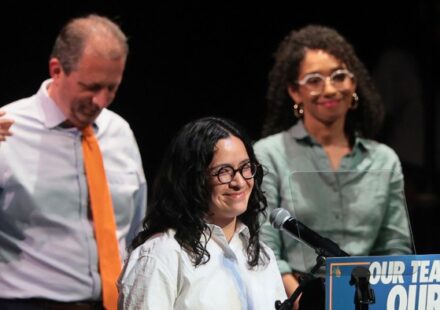 Labor union members and political candidates at a campaign event illustrating the changing role of labor union endorsements in NYC elections.
