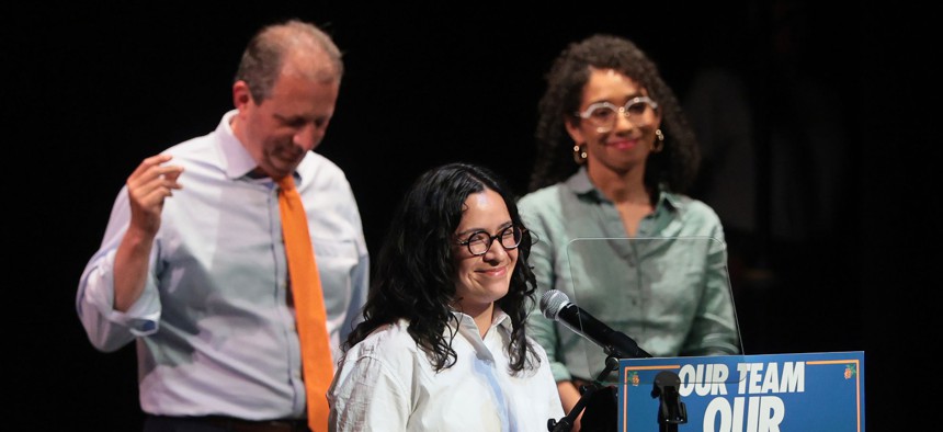 Labor union members and political candidates at a campaign event illustrating the changing role of labor union endorsements in NYC elections.