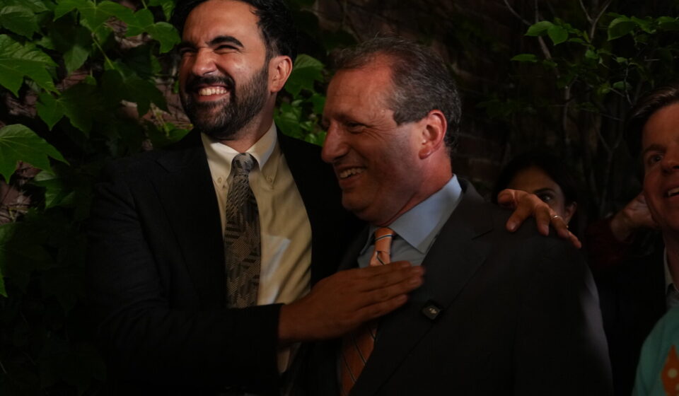 Mayor Zohran Mamdani celebrates with supporters after progressive-backed candidates won key 2026 NYC Democratic primary races.