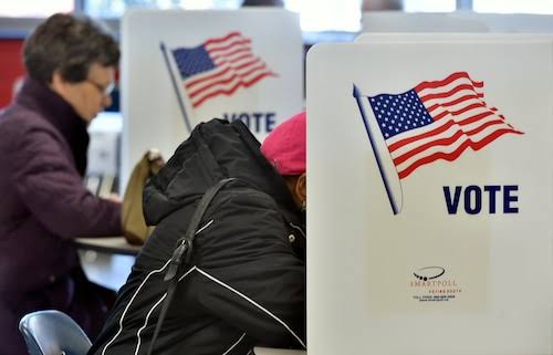 Election workers reviewing ballots during an NYC Board of Elections manual recount following the 2026 primary elections.
