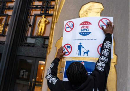 Campaign volunteers and candidates engaging voters during the 2026 NYC elections, illustrating evolving campaign strategy and grassroots organizing.