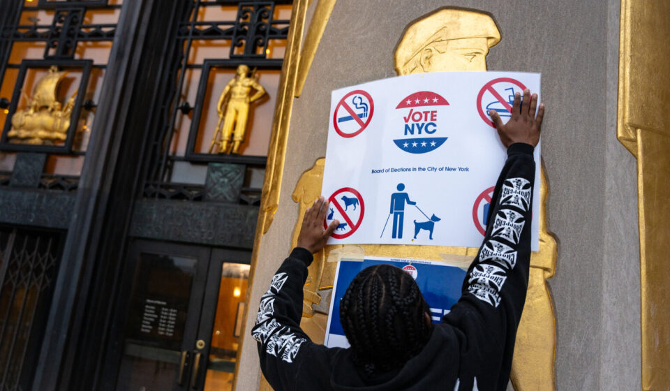 Campaign volunteers and candidates engaging voters during the 2026 NYC elections, illustrating evolving campaign strategy and grassroots organizing.