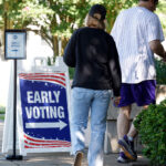New York City voters participating in an election, illustrating the debate over NYC open primaries and election reform