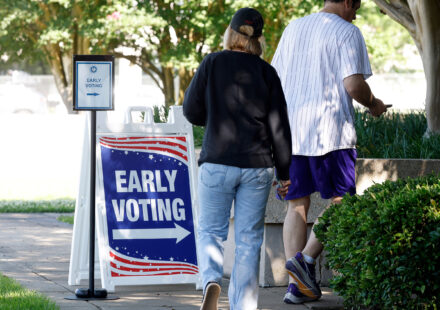 New York City voters participating in an election, illustrating the debate over NYC open primaries and election reform