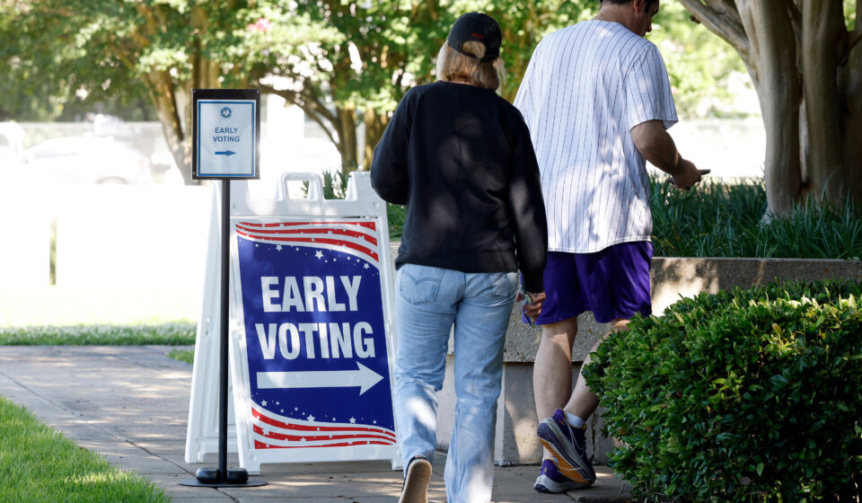 New York City voters participating in an election, illustrating the debate over NYC open primaries and election reform