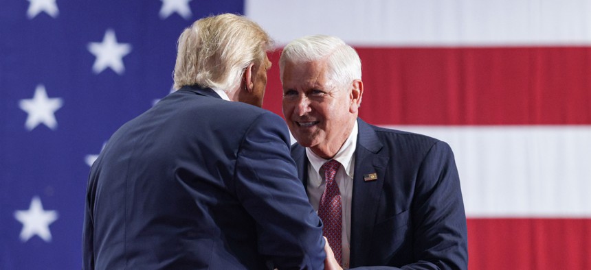 Bruce Blakeman and Donald Trump at a campaign rally in Syracuse during the 2026 New York gubernatorial election.